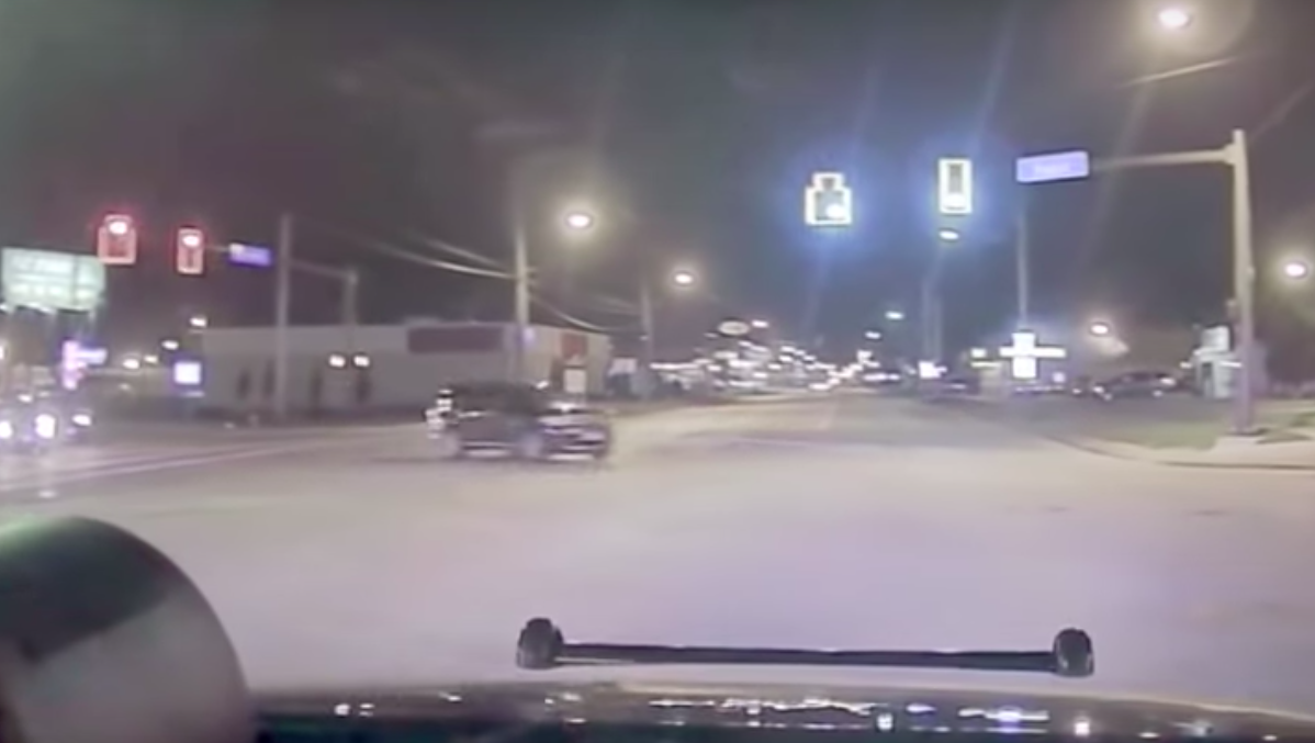 The boy can be seen speeding past a red light on the wrong side of the road. Source: Cleveland Police