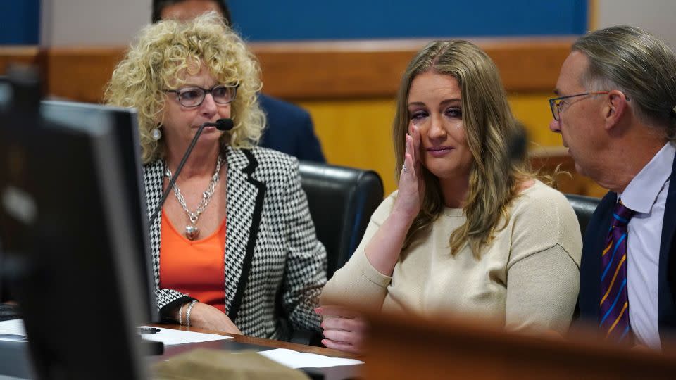 Jenna Ellis reacts after pleading guilty to a felony count of aiding and abetting false statements and writings on October 24 in Atlanta. - John Bazemore/Pool/Getty Images