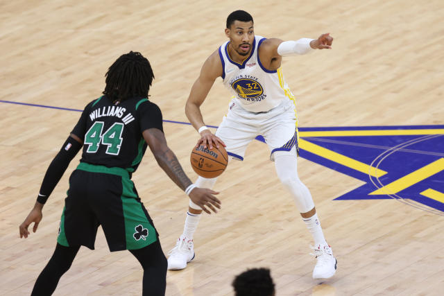 SAN FRANCISCO, CALIFORNIA - JUNE 13: Otto Porter Jr. #32 of the Golden State Warriors sets the play against Robert Williams III #44 of the Boston Celtics during the third quarter in Game Five of the 2022 NBA Finals at Chase Center on June 13, 2022 in San Francisco, California. NOTE TO USER: User expressly acknowledges and agrees that, by downloading and/or using this photograph, User is consenting to the terms and conditions of the Getty Images License Agreement. (Photo by Lachlan Cunningham/Getty Images)