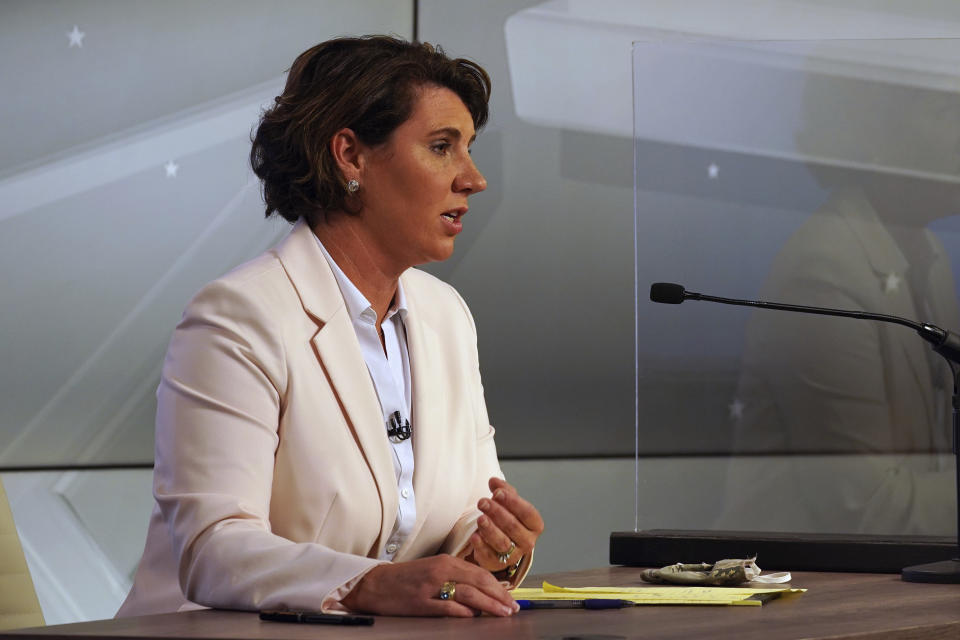 Democratic challenger Amy McGrath speaks during a debate with Senate Majority Leader Mitch McConnell, R-Ky., in Lexington, Ky., Monday, Oct. 12, 2020. (Michael Clubb/The Kentucky Kernel via AP, Pool)