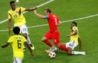 <p>Harry Kane is brought down by Jefferson Lerma </p>