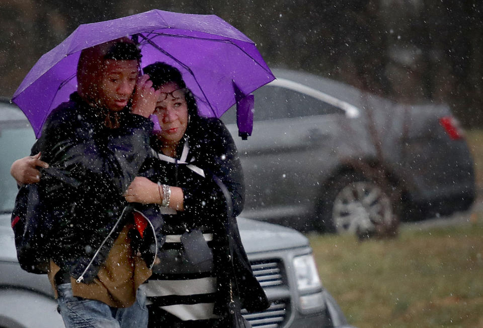 <p>A student from Great Mills High School is comforted by a guardian while being picked up at Leonardtown High School following a school shooting at Great Mills High School March 20, 2018 in Leonardtown, Md. (Photo: Win McNamee/Getty Images) </p>