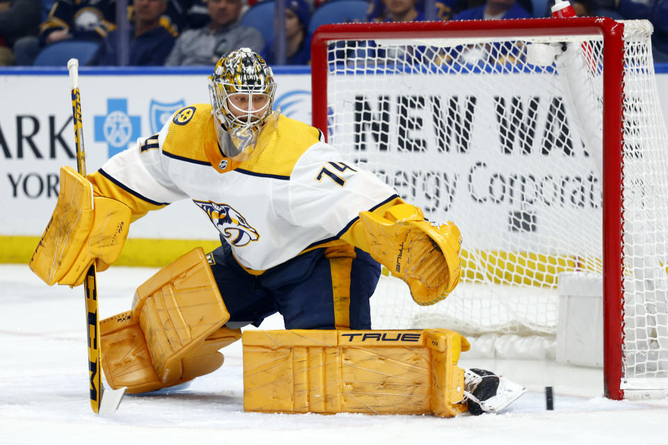 Nashville Predators goaltender Juuse Saros (74) makes a pad save during the first period of an NHL hockey game against the Buffalo Sabres, Tuesday, March 21, 2023, in Buffalo, N.Y. (AP Photo/Jeffrey T. Barnes)