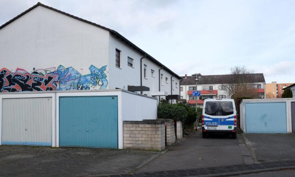 A police van outside the home of the gunman, Tobias Rathjen, in Hanau