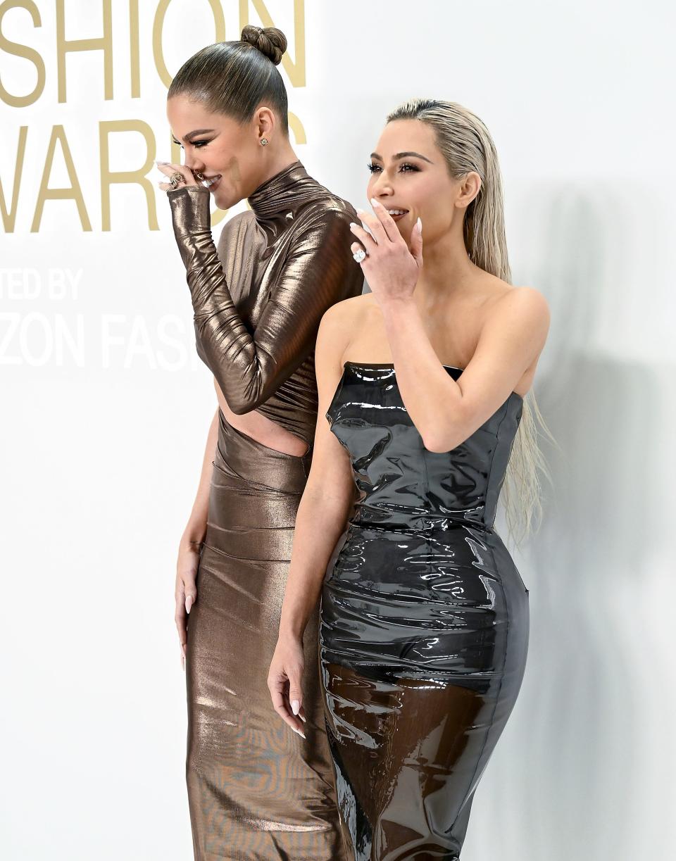 Khloe Kardashian, left, and Kim Kardashian attend the CFDA Fashion Awards at Cipriani South Street on Monday, Nov. 7, 2022, in New York. (Photo by Evan Agostini/Invision/AP) ORG XMIT: NYEA208