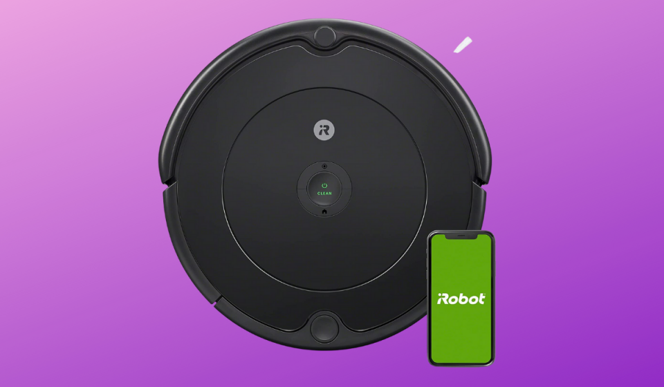 A black robot vacuum with an iPhone reading 