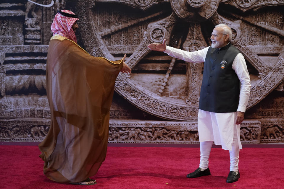 Indian Prime Minister Narendra Modi, right, welcomes Crown Prince Mohammed bin Salman of Saudi Arabia upon his arrival at Bharat Mandapam convention centre for the G20 Summit in New Delhi, India, Saturday, Sept. 9, 2023. (AP Photo/Evan Vucci, Pool)