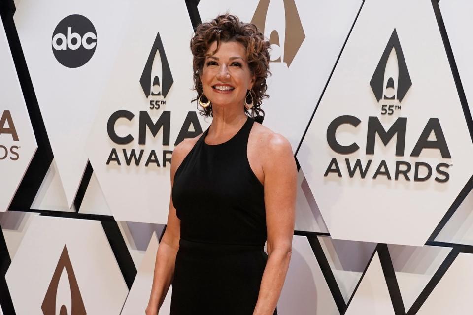 Amy Grant arrives at the 55th annual CMA Awards on Nov. 10, 2021, at the Bridgestone Arena in Nashville.