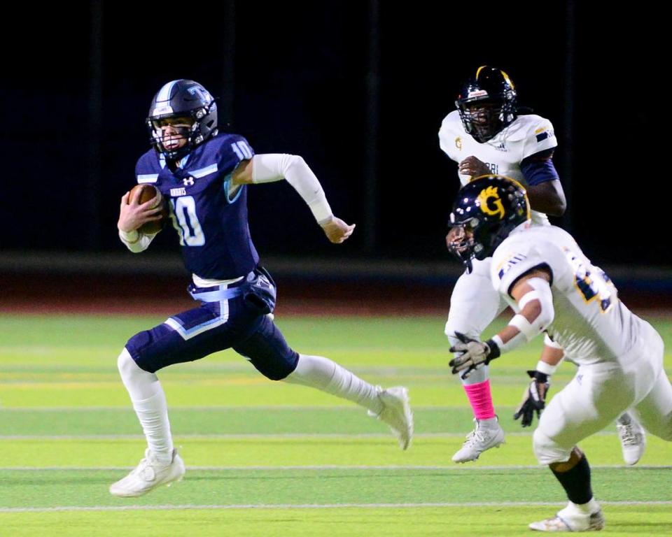 Downey quarterback Carson Lamb (10) scrambles out of the pocket during a game between Downey and Gregori at Downey High School in Modesto, California on October 27, 2023.