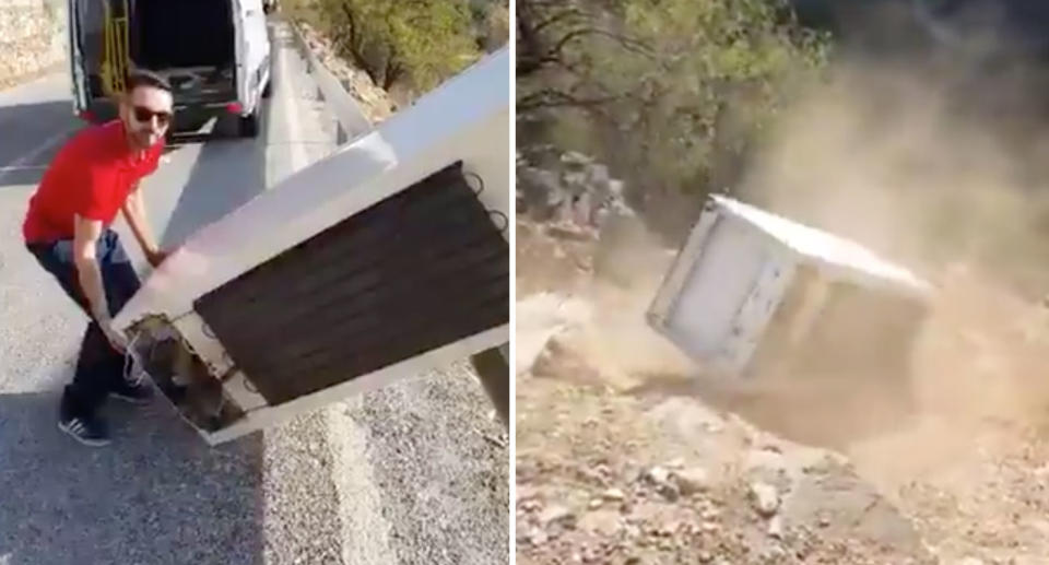 A Spanish man is seen pushing an old fridge off a cliff before it tumbles down the steep decline.