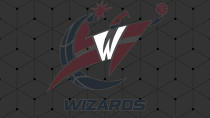 Within this previous logo design, a wizard is playing basketball wearing a W which represents Washington D.C.