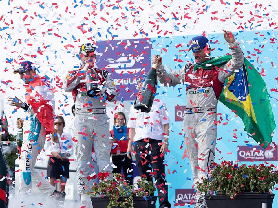 Race winner Lucas di Grassi celebrates an Audi one-two on the podium (Formula E)