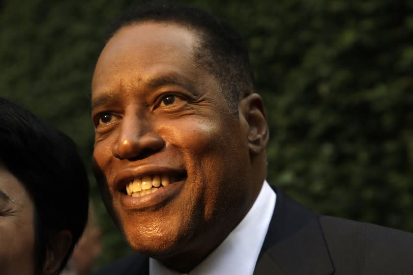 WOODLAND HILLS, CA - AUGUST 24, 2021 - Conservative radio talk show host Larry Elder, who is running for governor of California, greets supporters at the Warner Center Marriott in Woodland Hills on August 10, 2021. (Genaro Molina / Los Angeles Times)