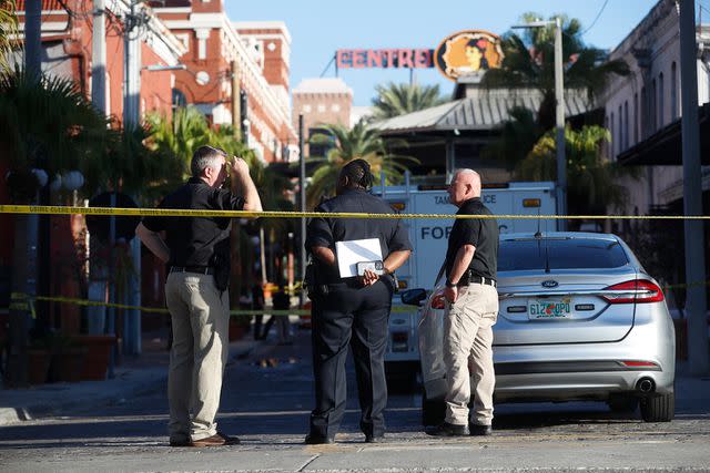 <p>Octavio Jones/Getty</p> The Tampa Police Department and the Hillsborough County Sheriff's Office investigating a fatal shooting in the Ybor City neighborhood on October 29, 2023 in Tampa