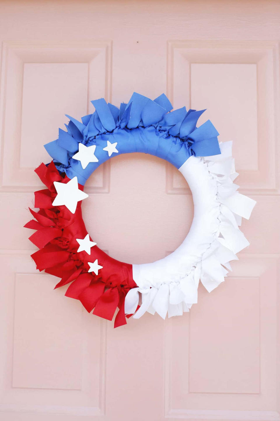red, white and blue ribbon wreath (A Beautiful Mess)