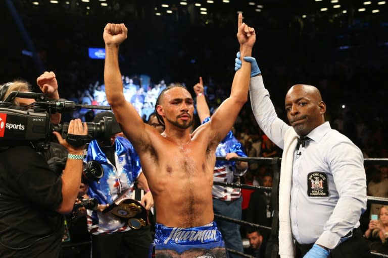 Keith Thurman celebrates his unanimous decision win over Shawn Porter in June 2016