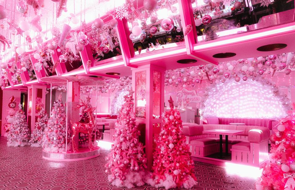 Pink Christmas trees figure prominently at pop-up bar "A Pink Wonderland" in Chicago.