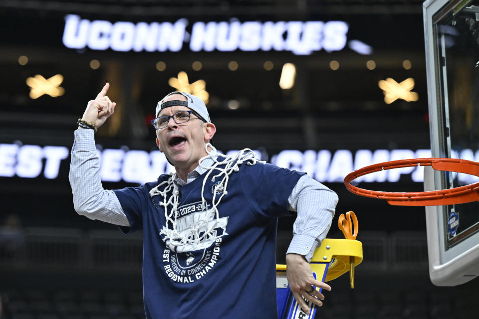 UConn head coach Dan Hurley celebrates after cutting down the netting from the 82-54 win against Gonzaga of an Elite 8 college basketball game in the West Region final of the NCAA Tournament, Saturday, March 25, 2023, in Las Vegas. (AP Photo/David Becker)