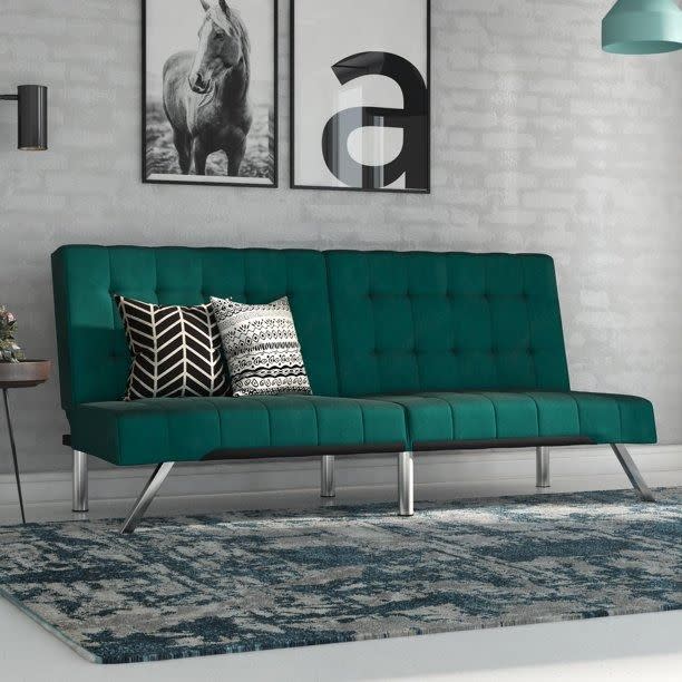 <p><a href="https://go.redirectingat.com?id=74968X1596630&url=https%3A%2F%2Fwww.walmart.com%2Fip%2FDHP-Emily-Convertible-Tufted-Futon-Sofa-Navy-Blue-Linen%2F957459958&sref=https%3A%2F%2Fwww.housebeautiful.com%2Fshopping%2Ffurniture%2Fg32981471%2Fmost-comfortable-futon%2F" rel="nofollow noopener" target="_blank" data-ylk="slk:Shop Now;elm:context_link;itc:0;sec:content-canvas" class="link rapid-noclick-resp">Shop Now</a></p><p>Emily Convertible Tufted Futon</p><p>walmart.com</p><p>$219.99</p>