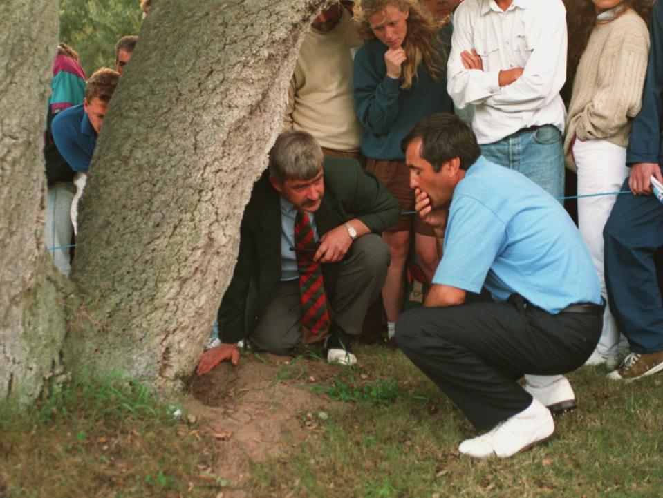 Paramor with Seve Ballesteros, inspecting the hole into which the Spaniard's ball had dropped during the Volvo Masters at Sotogrande in Spain in 1994 - Steve Munday/ALLSPORT