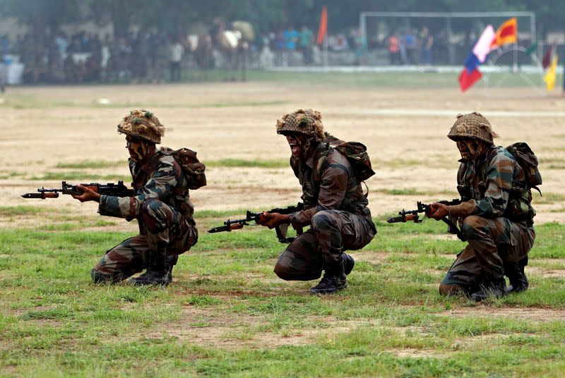 FILE PHOTO: Indian Army soldiers participate in a war exercise during a two-day "Know Your Army" exhibition in Ahmedabad