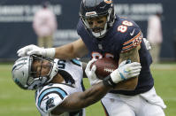 <p>Chicago Bears tight end Zach Miller (86) stiff arms Carolina Panthers linebacker Shaq Green-Thompson (54) during the first half of an NFL football game, Sunday, Oct. 22, 2017, in Chicago. (AP Photo/Charles Rex Arbogast) </p>