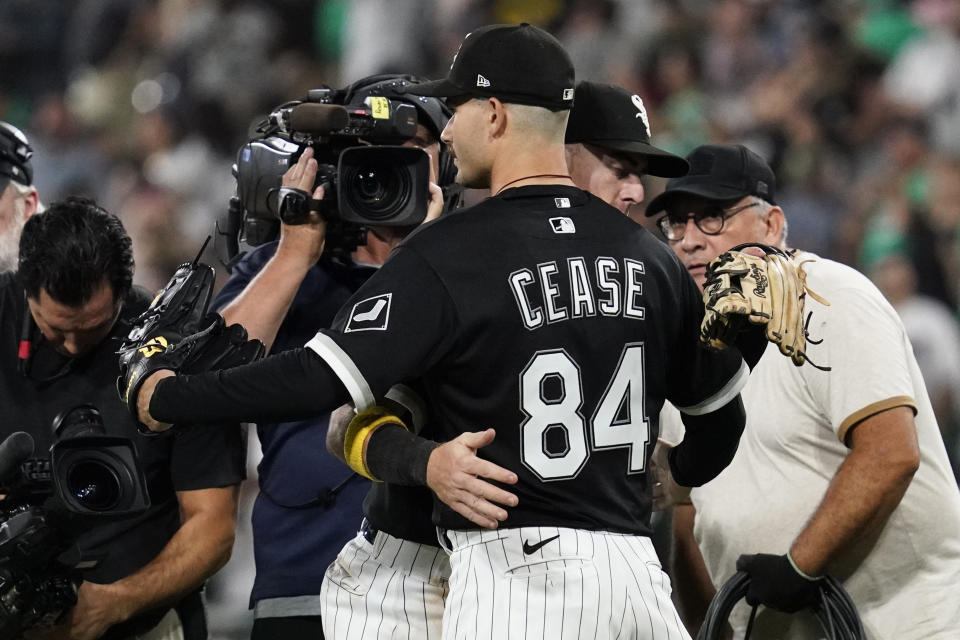 Chicago White Sox starting pitcher Dylan Cease (84) celebrates with Romy Gonzalez after the White Sox defeated the Minnesota Twins 13-0 in a baseball game in Chicago, Saturday, Sept. 3, 2022. (AP Photo/Nam Y. Huh)