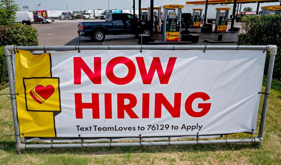 A "Now Hiring" sign is seen at Love's in Oklahoma City.