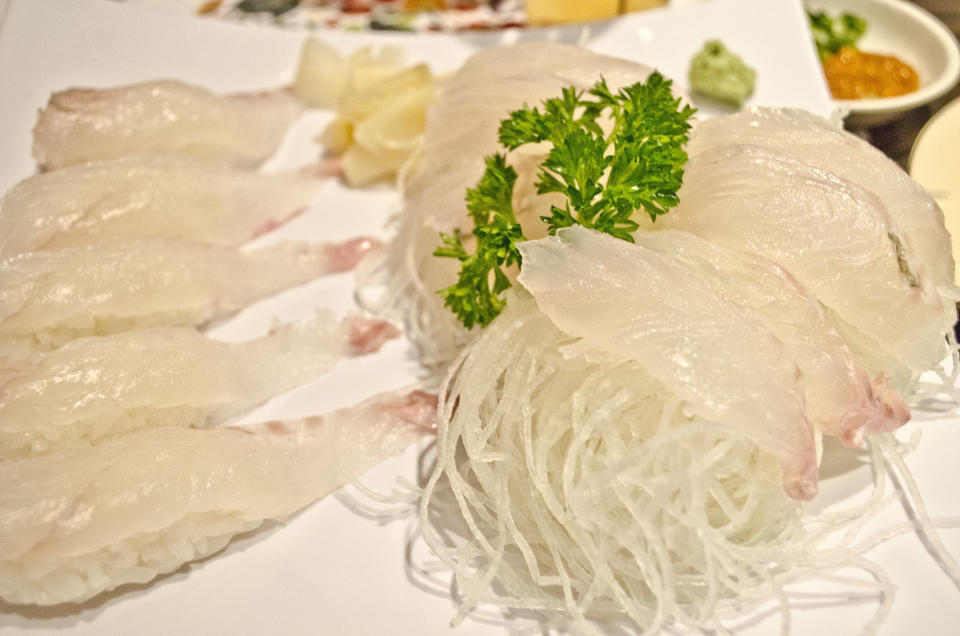 Thin slices of raw fluke at Sunny Sashimi, one of the few places in New York serving traditional Korean-style sashimi.