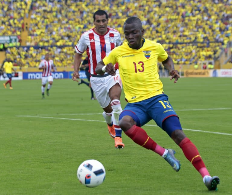 Ecuador's Enner Valencia makes a break against Paraguay during their 2018 FIFA World Cup South American qualifier in Quito on March 24, 2016