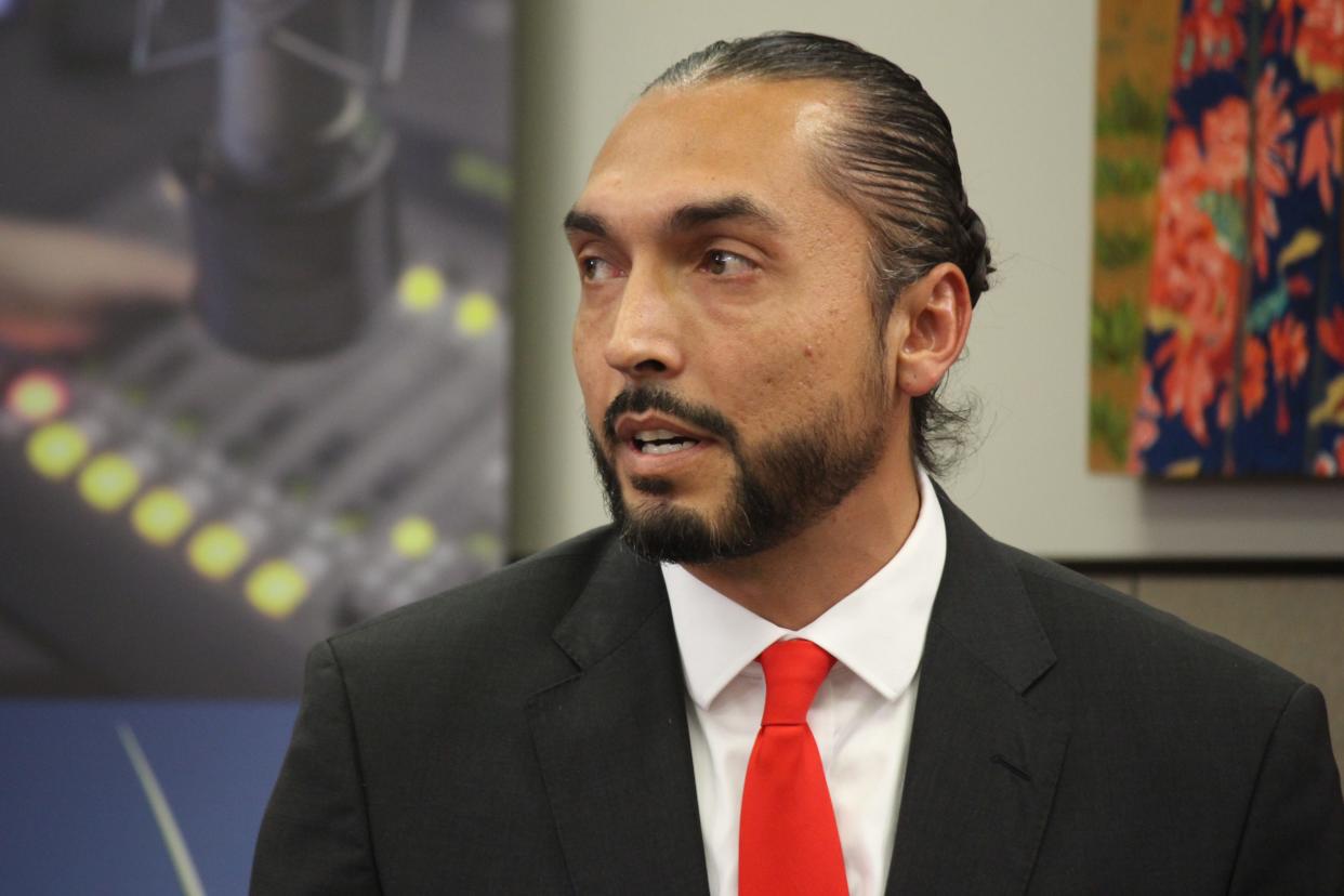 Adam Hernandez responds to a question during a mayoral candidate forum in April 2022 at the Patterson Library.