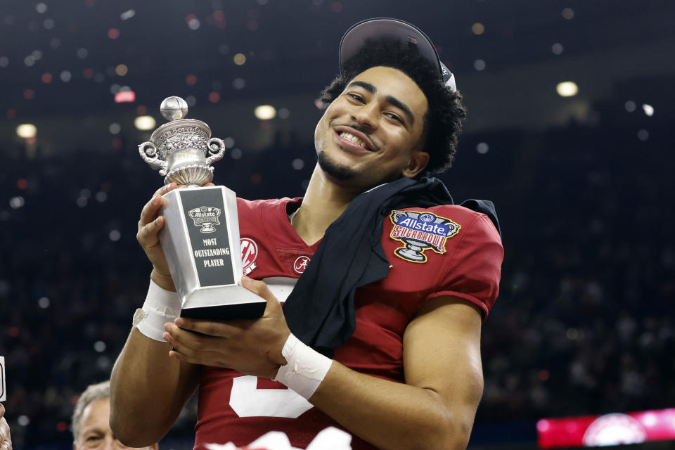 Alabama quarterback Bryce Young holds the Most Outstanding Player trophy as he celebrates after the Sugar Bowl NCAA college football game where Alabama defeated Kansas State 45-20, Saturday, Dec. 31, 2022, in New Orleans. (AP Photo/Butch Dill)