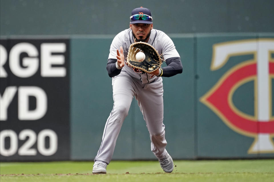 Detroit Tigers first baseman Harold Castro fields the ball as Minnesota Twins' Jorge Polanco grounds out in the first inning of a baseball game, Wednesday, July 28, 2021, in Minneapolis. (AP Photo/Jim Mone)