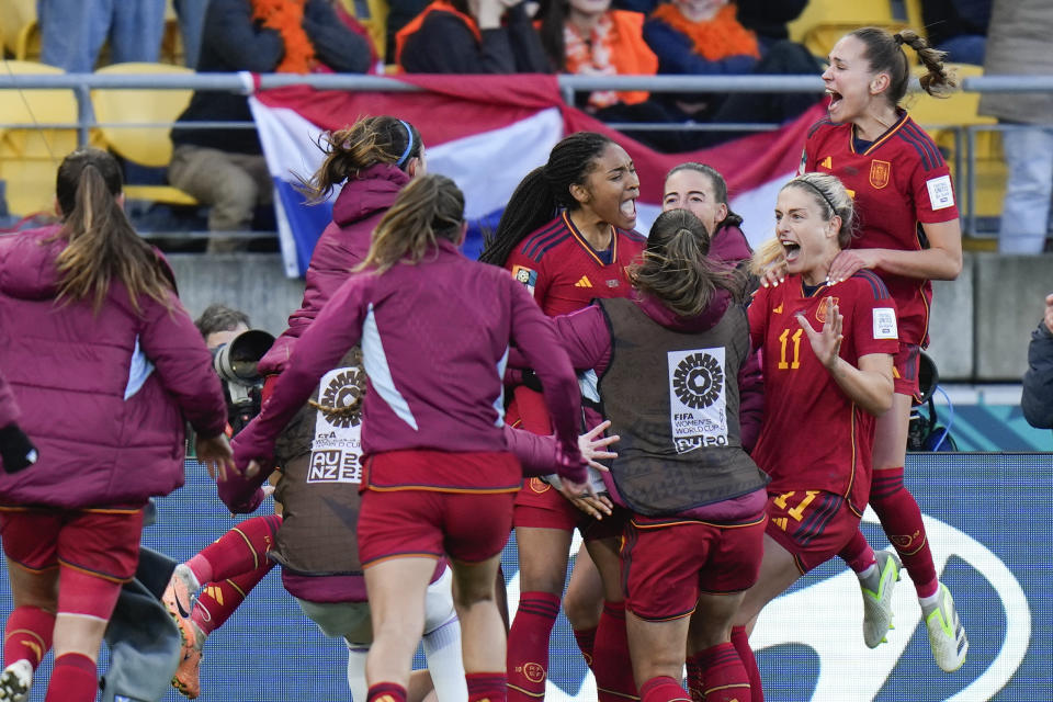 Spain's Salma Paralluelo, centre, celebrates with teammates after scoring her team's second goal during extra time play at the Women's World Cup quarterfinal soccer match between Spain and the Netherlands in Wellington, New Zealand, Friday, Aug. 11, 2023. (AP Photo/Alessandra Tarantino)