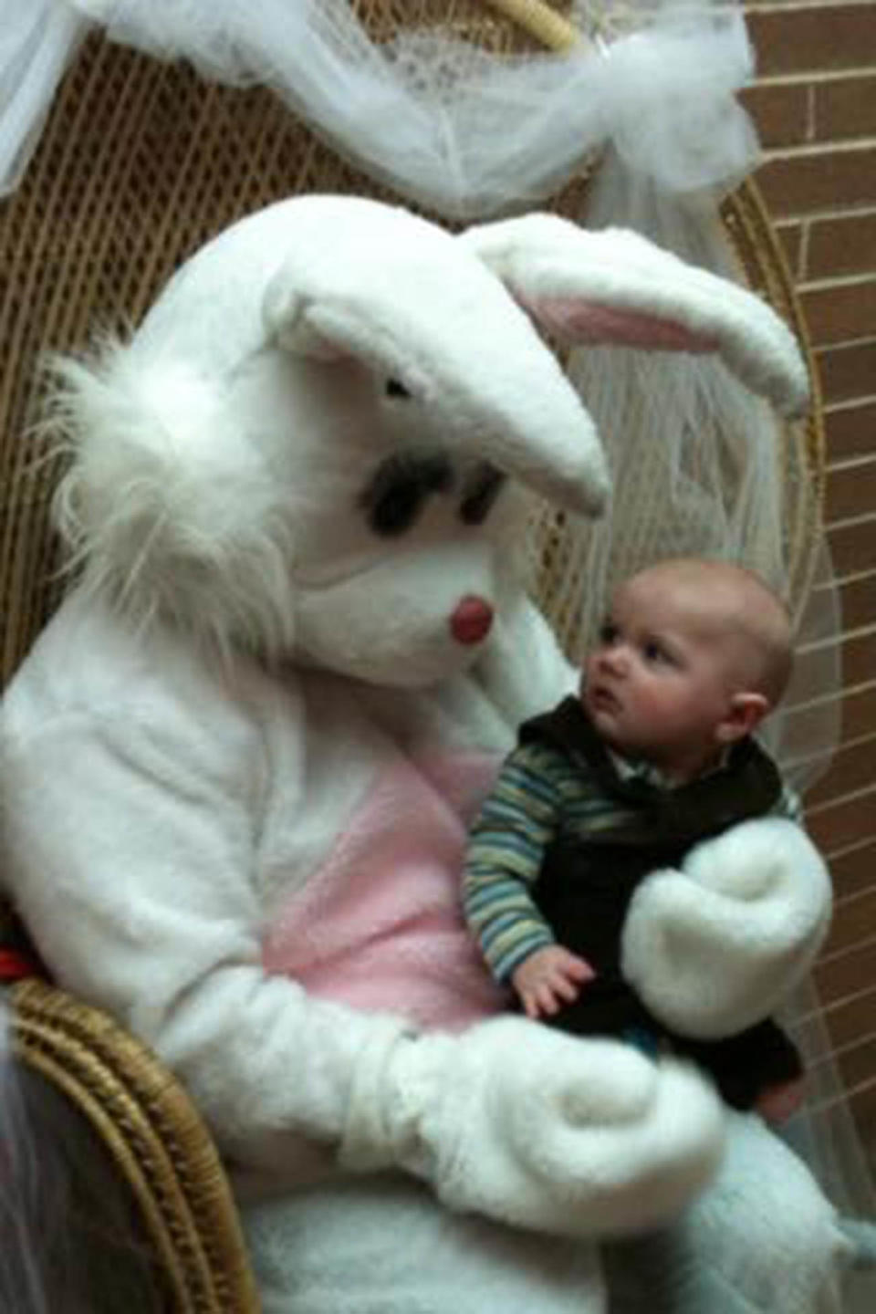 Meeting the Easter Bunny for the first time ... and not so sure about it.