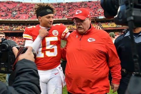 Kansas City Chiefs quarterback Patrick Mahomes (15) walks off the field with Kansas City Chiefs head coach Andy Reid following an NFL football game against the Arizona Cardinals in Kansas City, Mo. It has been a whirlwind first 11 weeks for the Kansas City Chiefs, filled with record-setting performances, high-scoring losses and the emergence of first-year starter Patrick Mahomes as one of the brightest young quarterbacks in the NFL - Credit: AP Photo/Ed Zurga