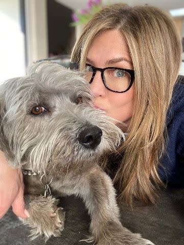 <p>Courtesy of Jennifer Aniston</p> Jennifer Aniston and her rescue dog, Clyde