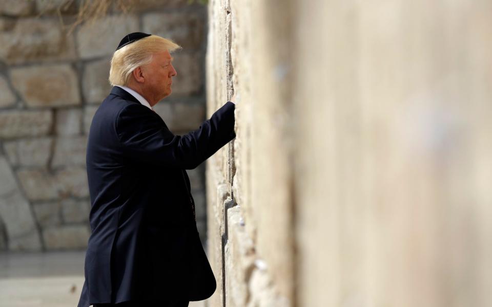 Mr Trump at the Western Wall - Credit: AP