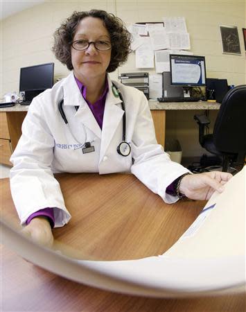 Dr. Pamela Banister poses while working at a clinic which is part of the Singing River Health System in Pascagoula, Mississippi September 26, 2013. REUTERS/Lyle Ratliff