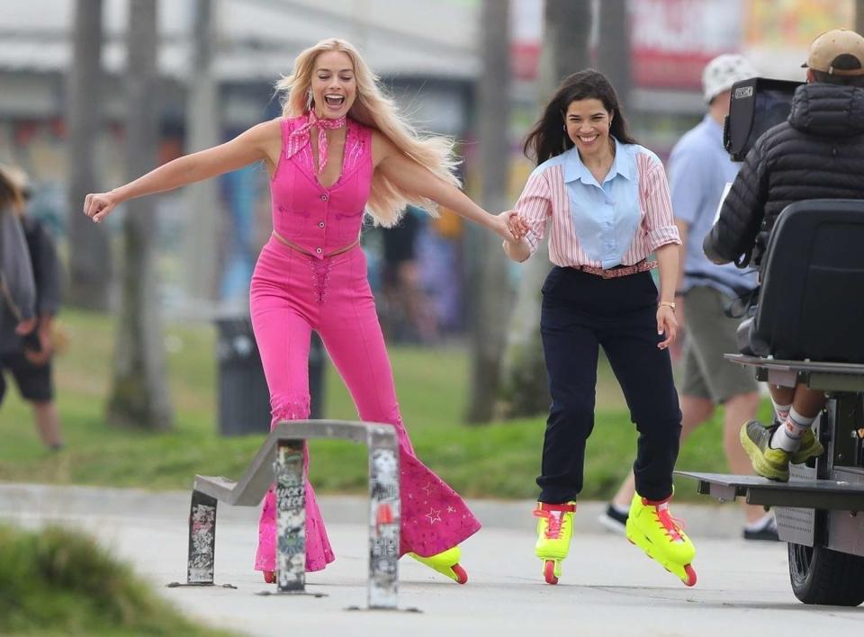 <p>Margot Robbie and America Ferrera have a blast on the set of the Barbie movie in Venice, California, on June 27.</p>