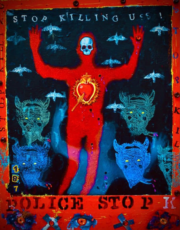 Diego Marcial Rios' painting "Stop Killing Us!" was removed with 19 other paintings from a public exhibit in San Mateo after complaints from police officers, he said. Photo courtesy of Diego Marcial Rios
