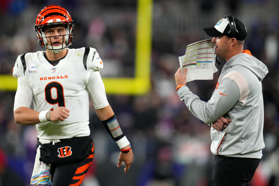 Oct 9, 2022; Baltimore, MD, USA; Cincinnati Bengals head coach Zac Taylor talks to Cincinnati Bengals quarterback Joe Burrow (9) in the fourth quarter during an NFL Week 5 game against the Baltimore Ravens, Sunday, Oct. 9, 2022, at M&T Bank Stadium in Baltimore. Mandatory Credit: Kareem Elgazzar-USA TODAY Sports