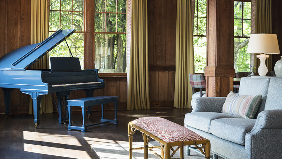 A gathering place off the inn’s main lobby features a blue baby grand piano. - Credit: Ball & Albanese