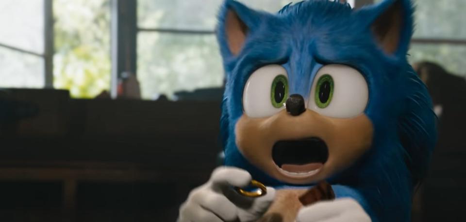 Sonic screaming in fright while holding a ring in "Sonic the Hedgehog"