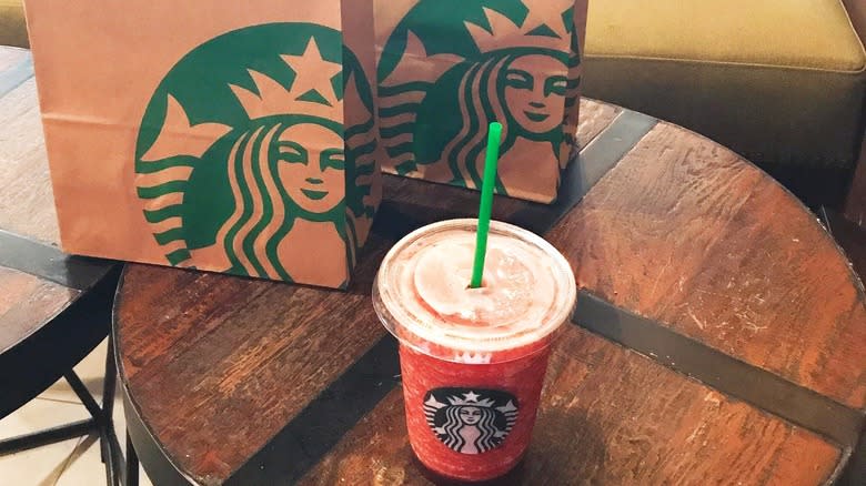 Blended pink Starbucks beverage