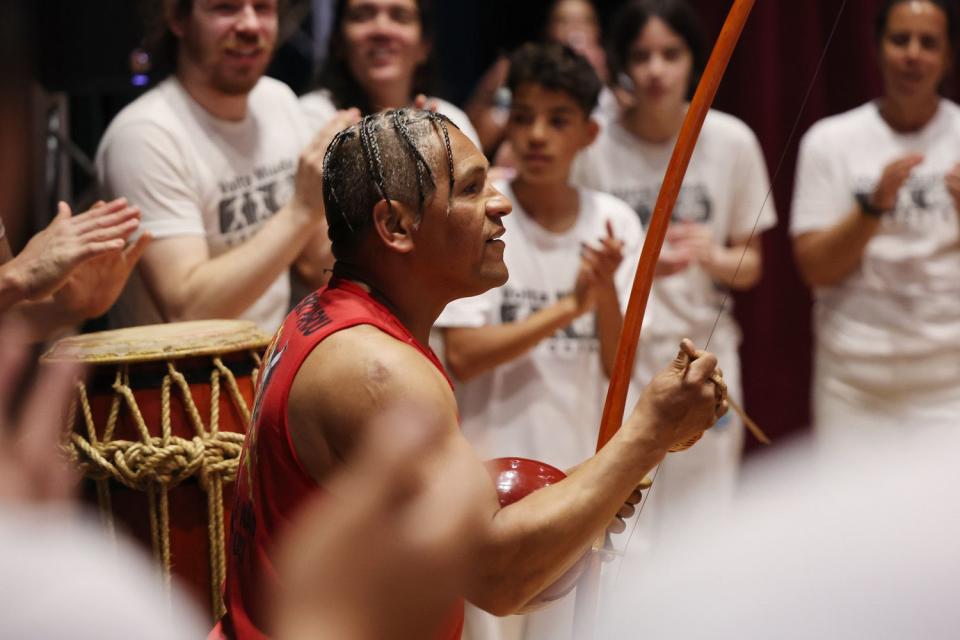 Sandro do Nascimento works with a class during a capoeira class at Trolley Square in Salt Lake City on April 28. 