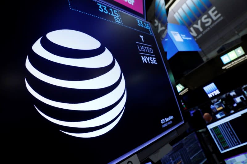 FILE PHOTO: The AT&T logo is seen on a monitor on the floor of the New York Stock Exchange (NYSE) in New York City, U.S. June 13, 2018. REUTERS/Brendan McDermid