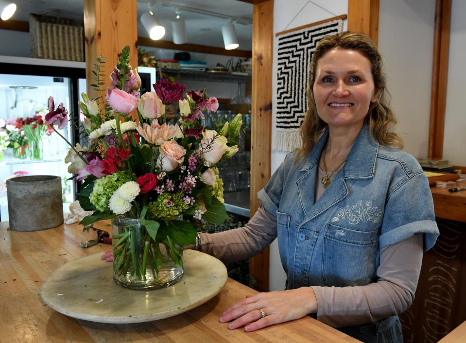 Meredith Moore, owner of Innerbloom Floral, with a finished designers choice arrangement for Valentine's Day Friday, Feb. 9, 2024, at 2908 Philadelphia Avenue in Ocean City, Maryland. The store offers deliveries Monday - Sunday.