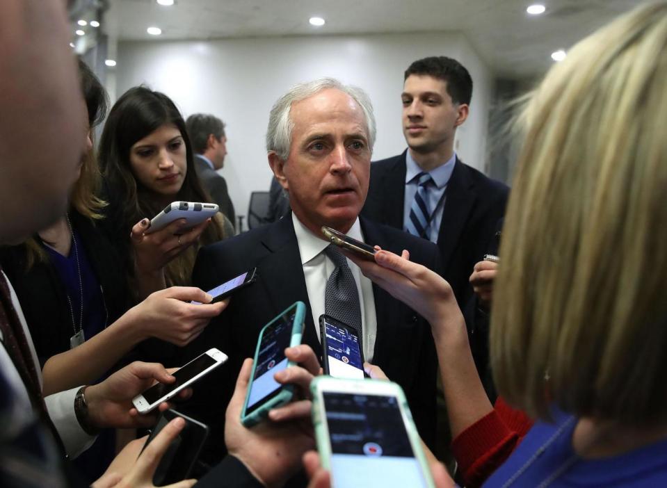 Senator Bob Corker speaks to reporters while going to the Senate Chamber for a vote on Capitol Hill (Getty Images)