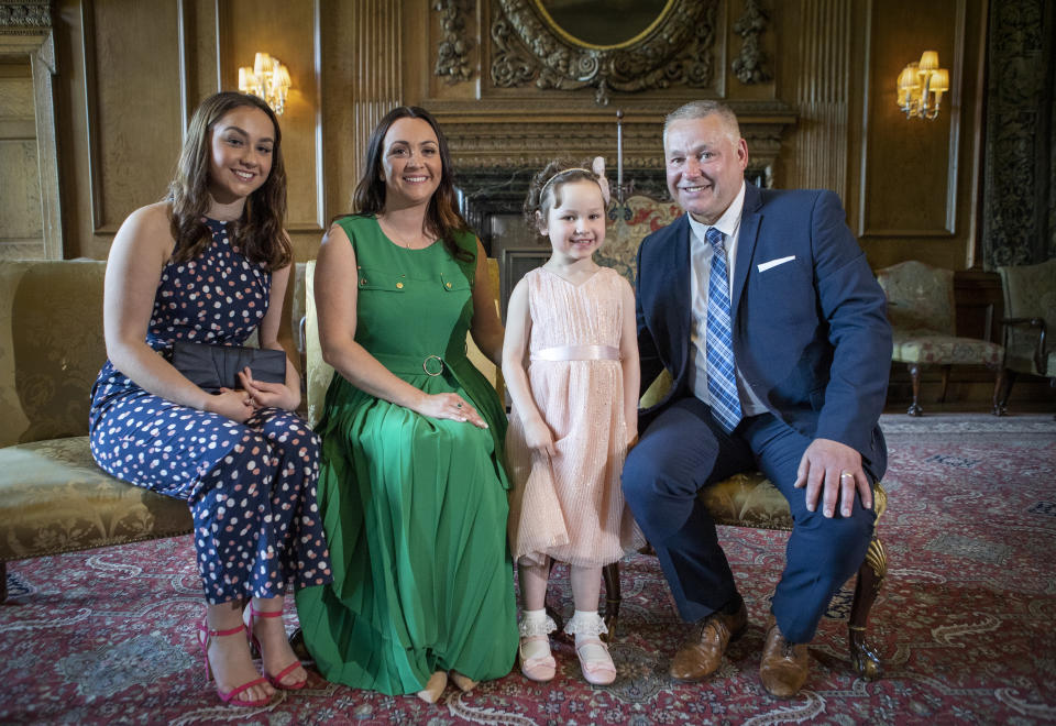 The Princess of Wales invited Mila Sneddon (second right) and her sister Jodi (left), mother Lynda (second left) and father Scott Sneddon to the Palace of Holyroodhouse in 2021 (Jane Barlow/PA)